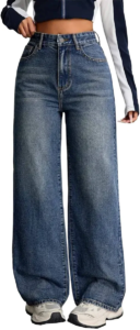 Cropped shot of a woman wearing a high-waisted pair of medium-wash blue denim jeans paired with a dark navy and white color-blocked crop top featuring contrast stitching.